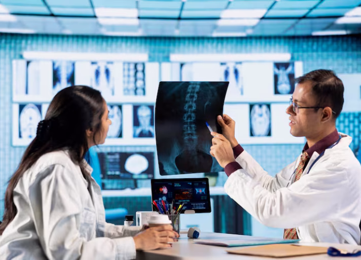 indian-expert-explaining-diagnostics-through-test-results-with-male-patient_482257-108258 indian-expert-explaining-diagnostics-through-test-results-with-male-patient_482257-108258